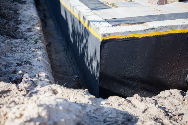 Professional Exterior Waterproofing technician working in Erie, IL